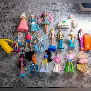 Mattel Doll Collection with Pink, Blue, and Gold Accents